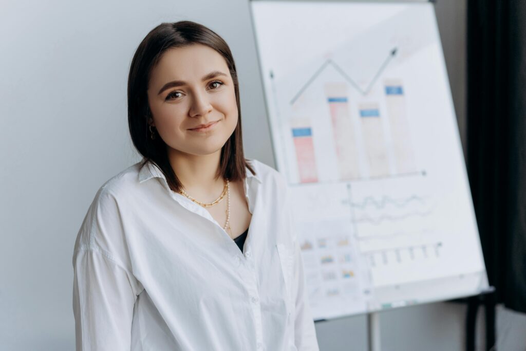 A digital marketer standing in front of some statistics.