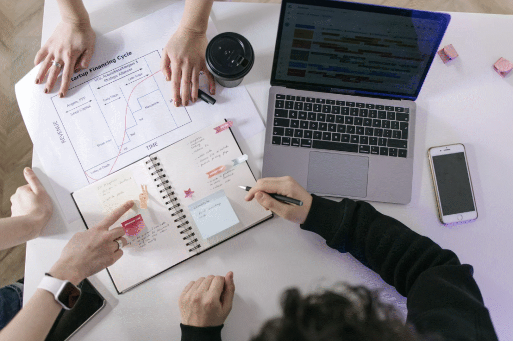 Group of people working on an ads strategy.