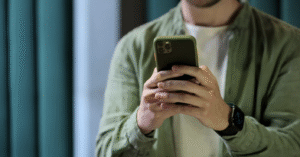Man examining social media on his phone.