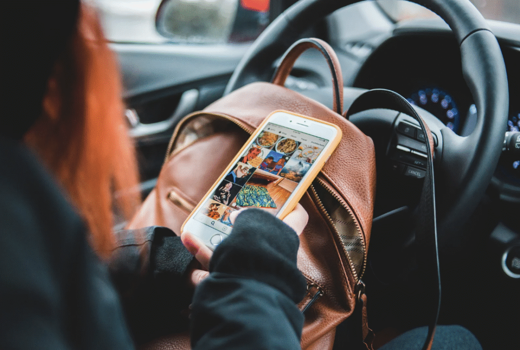 Woman looking at the impact of social media on her phone.