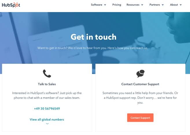 HubSpot's Get in Touch page with separate contact options for sales and customer support